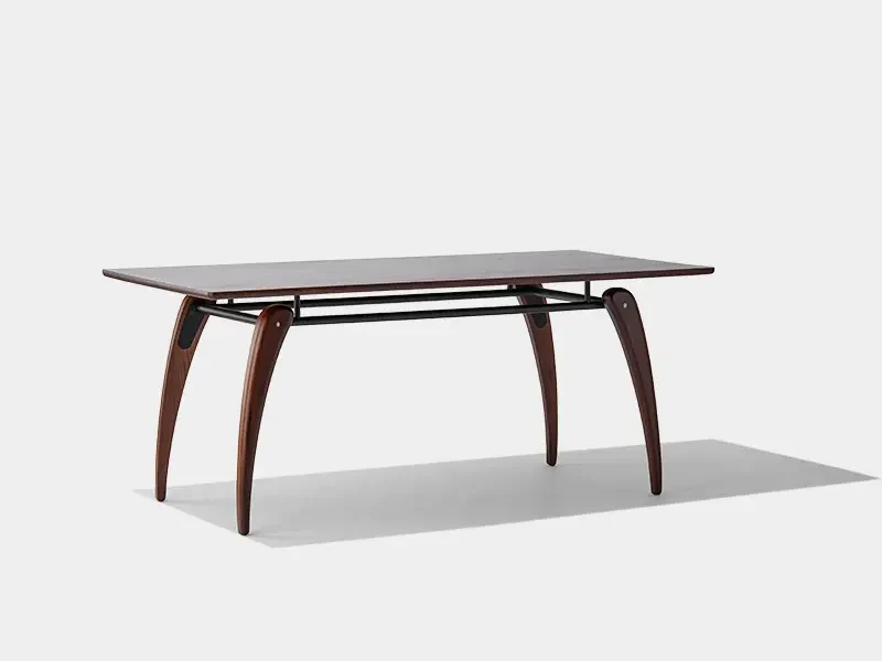 side angle view of curved wood leg restaurant dining table