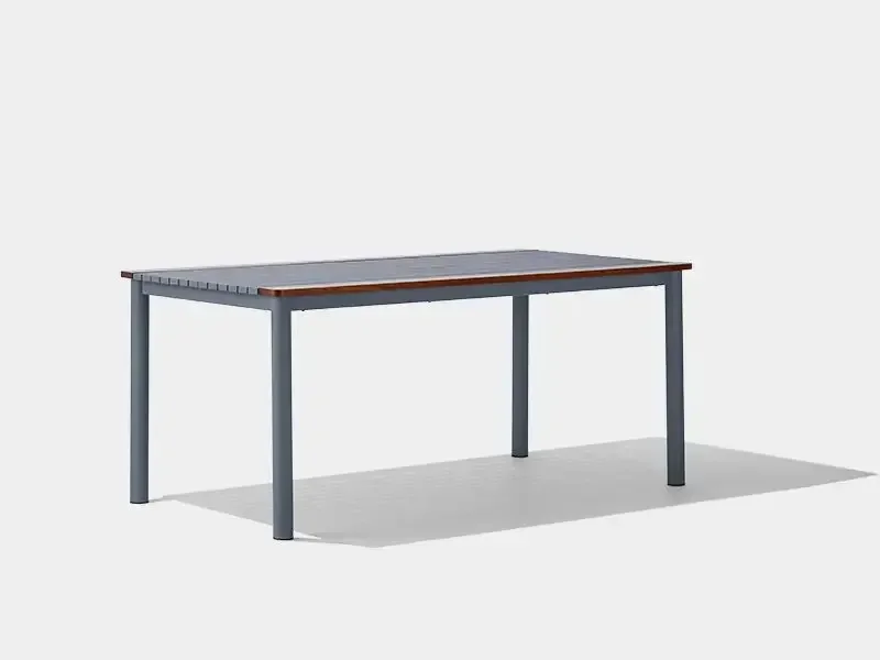 Angled view of metal frame outdoor dining table