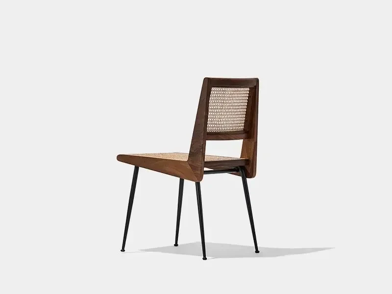 Rear three-quarter view of the CR215 walnut cane dining chair