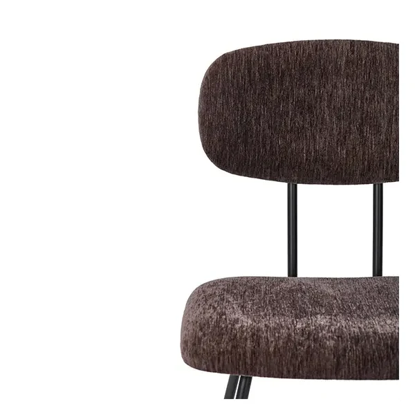 Close-up of the brown upholstered backrest and padded seat on the FD312 dining chair