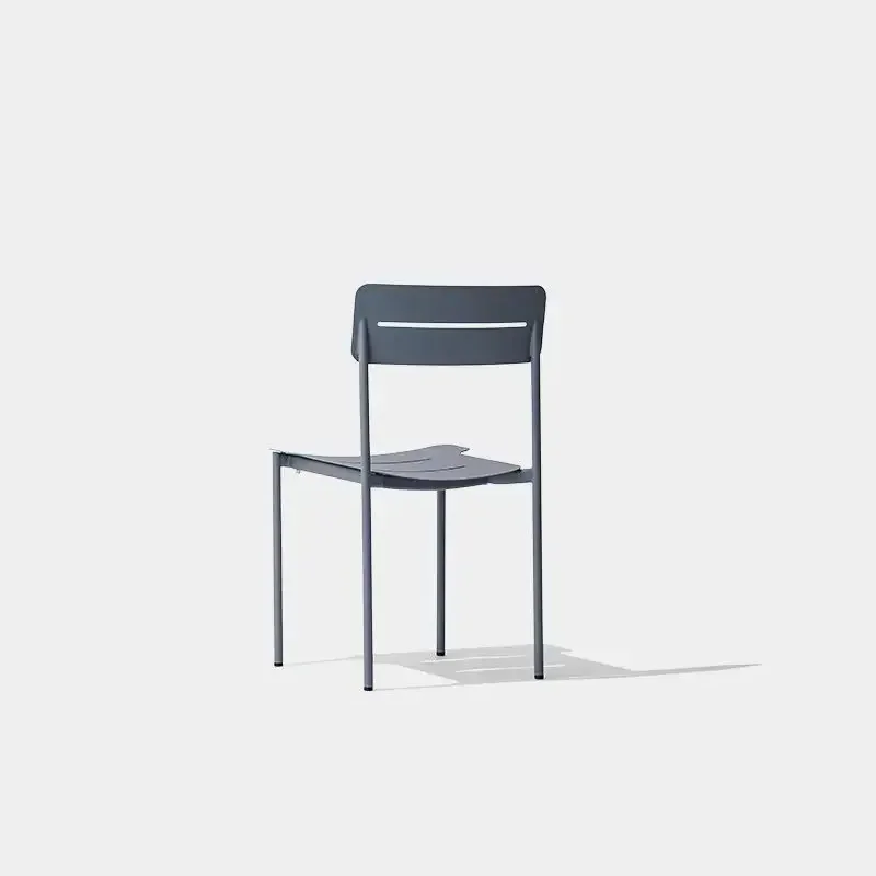 Rear three-quarter view of the MD308 gray metal dining chair