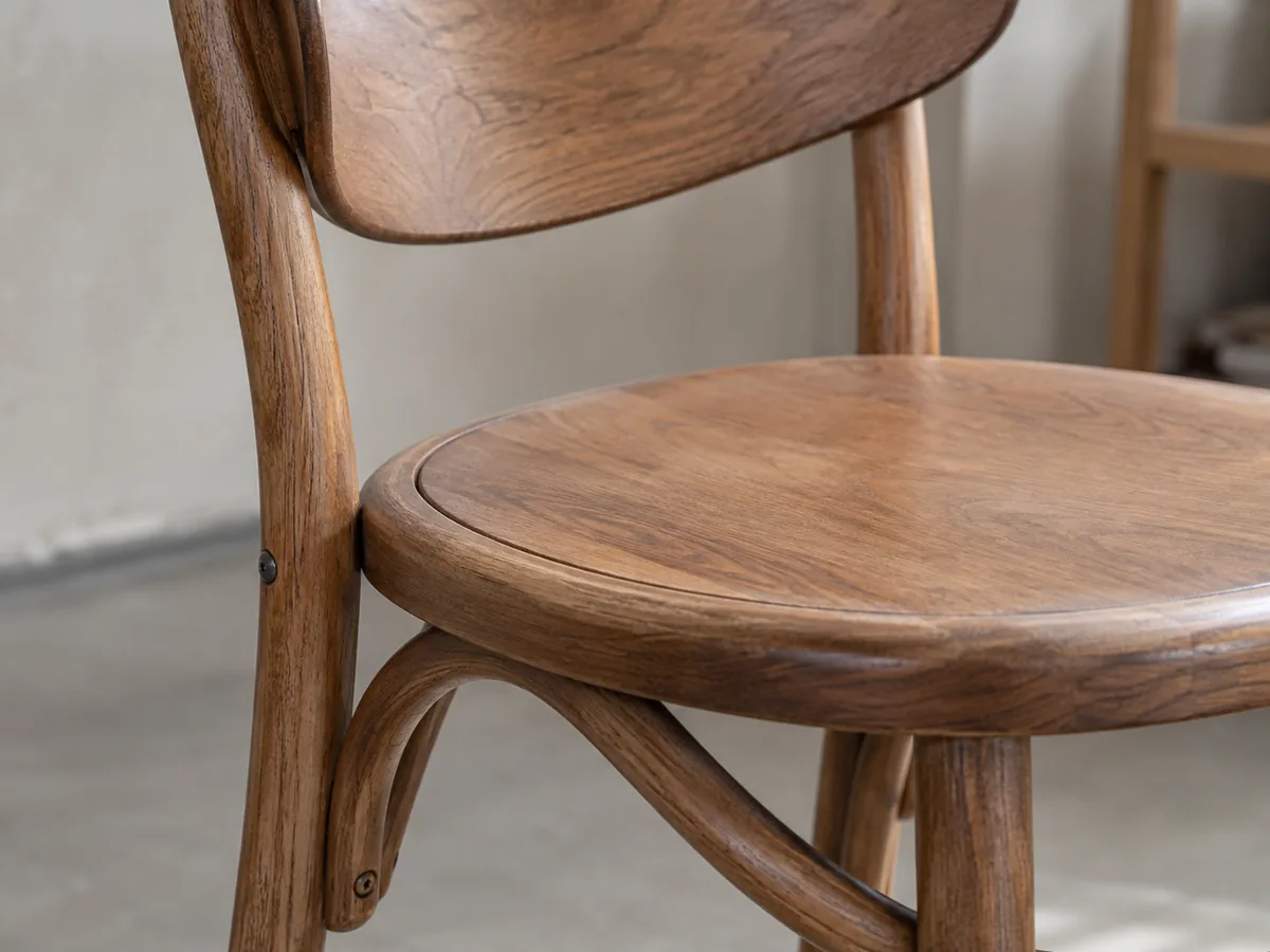 Bentwood Chairs: Types, Construction, Comfort & Prices Close view of curved wooden chair components and mechanical fastening points